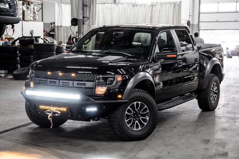 Ford Raptor in a garage