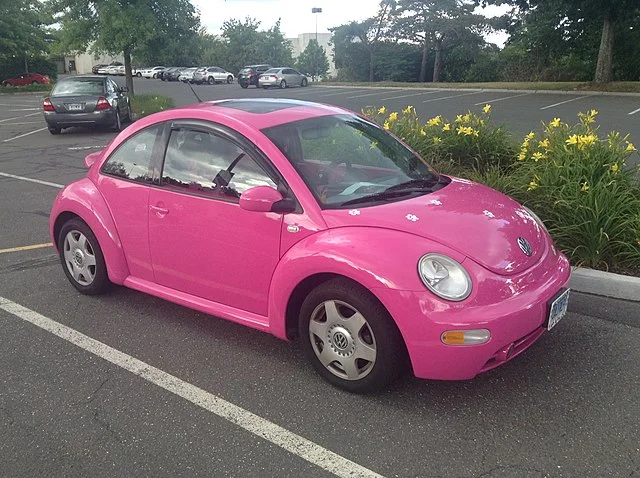 pink volkswagen beetle