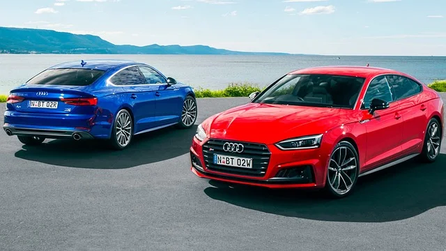 Red and blue Audi S5s